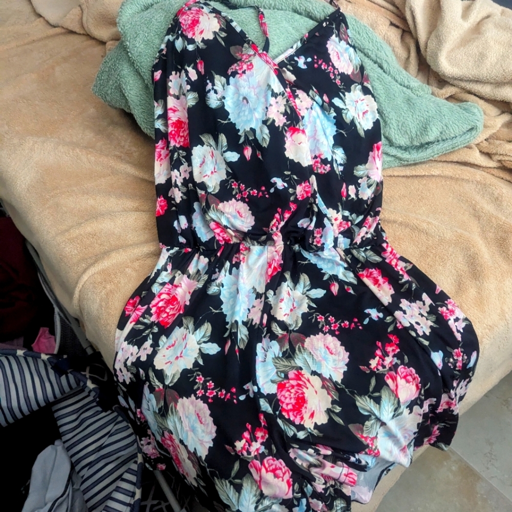 Black romper with pink and baby blue flower print